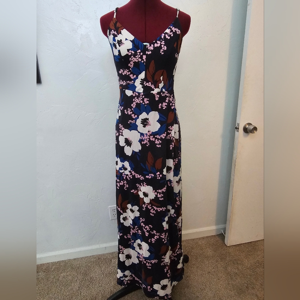 Navy blue dress with white, pink and blue floral design.